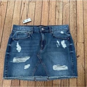 Distressed denim mini skirt